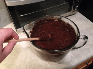 Make sure all the grounds are immersed. It may be necessary to push the grounds into the water with a spoon.